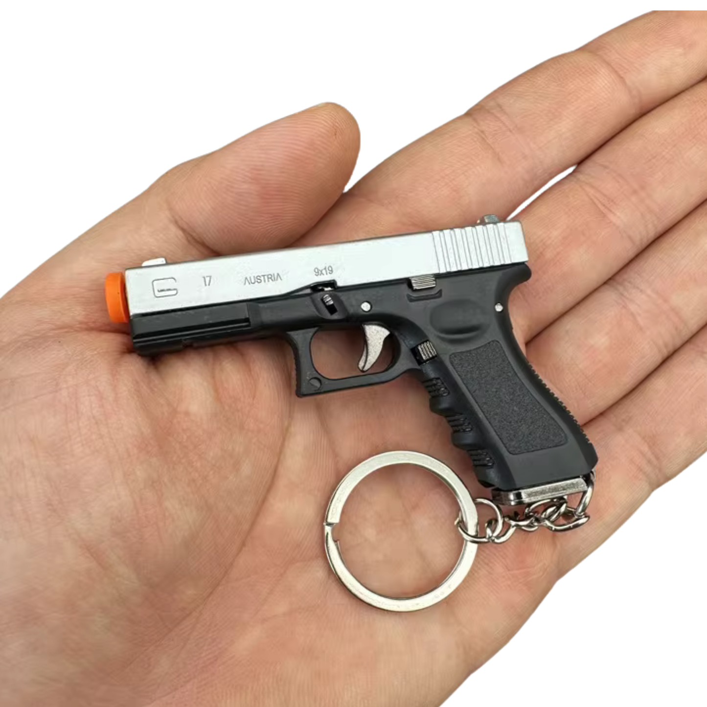 
                  
                    Mini G17 Keychain – Slide Action with Imitation Round
                  
                